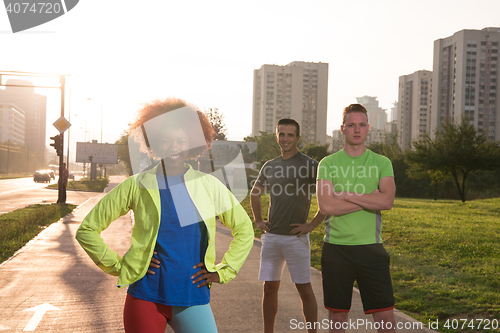 Image of portrait multiethnic group of people on the jogging