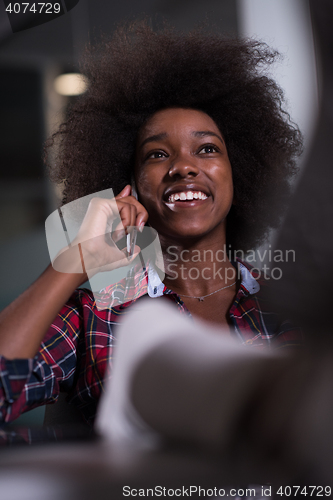 Image of portrait of a young successful African-American woman in modern 