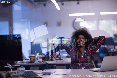 Image of portrait of a young successful African-American woman in modern 