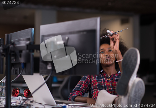 Image of portrait of a young successful African-American woman in modern 