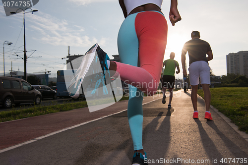 Image of multiethnic group of people on the jogging