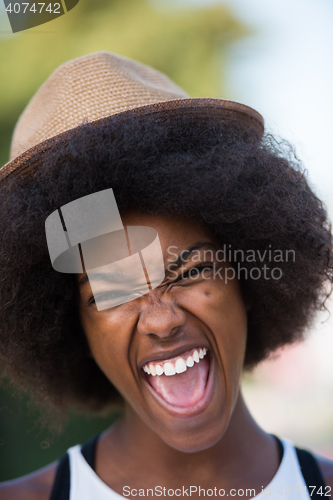 Image of Close up portrait of a beautiful young african american woman sm