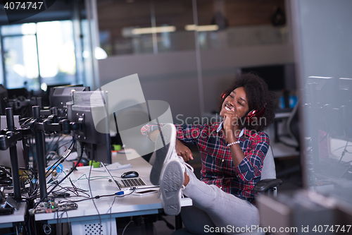 Image of portrait of a young successful African-American woman in modern 