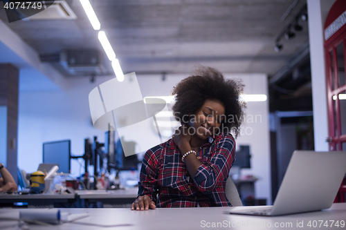 Image of portrait of a young successful African-American woman in modern 