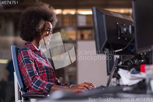 Image of portrait of a young successful African-American woman in modern 