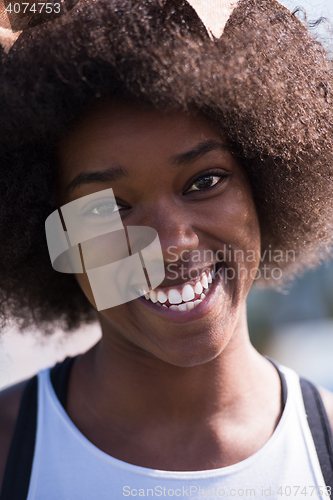 Image of Close up portrait of a beautiful young african american woman sm