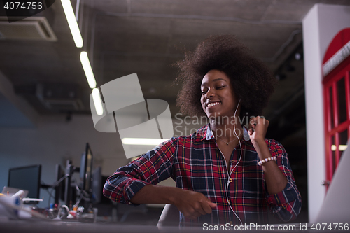 Image of portrait of a young successful African-American woman in modern 