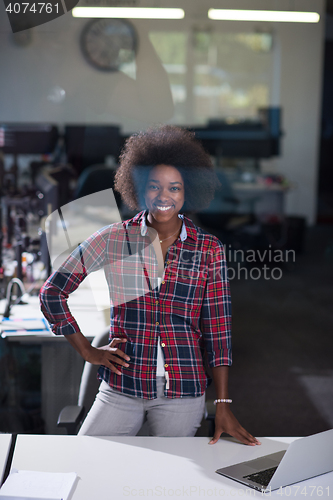 Image of portrait of a young successful African-American woman in modern 