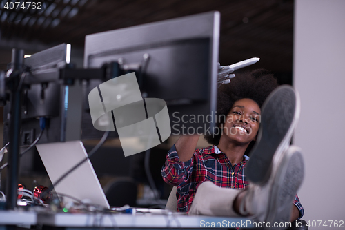 Image of portrait of a young successful African-American woman in modern 
