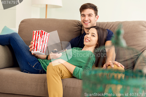 Image of Popcorns and Sofa