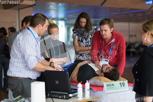 Image of Participants learning new ultrasound techniques on medical congress.