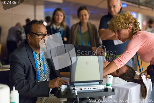 Image of Participants learning new ultrasound techniques on medical congress.