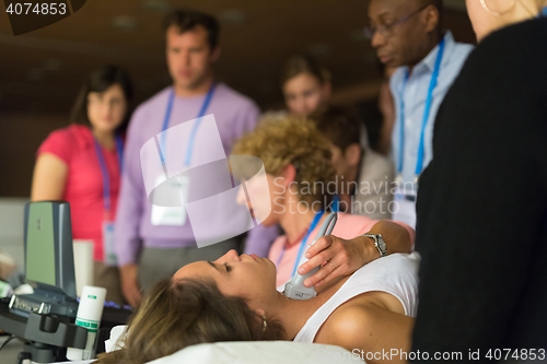 Image of Participants learning new ultrasound techniques on medical congress.