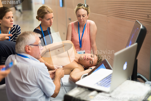 Image of Participants learning new ultrasound techniques on medical congress.