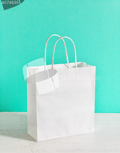 Image of white paper shopping bag