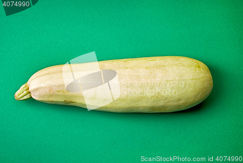 Image of fresh squash on green background