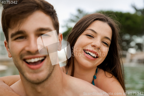 Image of Young couple having fun