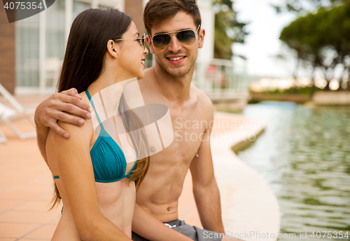 Image of Sitting by the pool