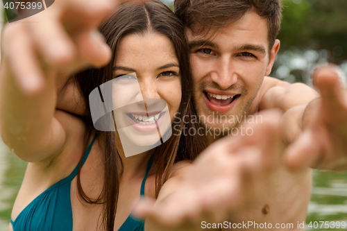 Image of Young couple having fun