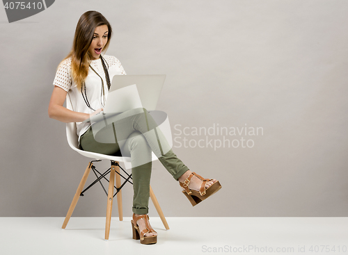 Image of Woman working with a lapptop