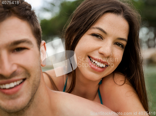 Image of Young couple having fun