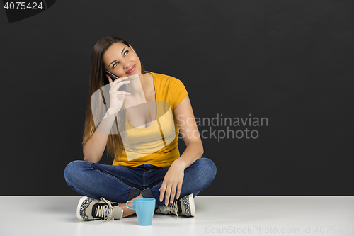 Image of Woman talking at phone