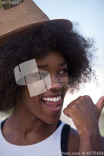 Image of Close up portrait of a beautiful young african american woman sm