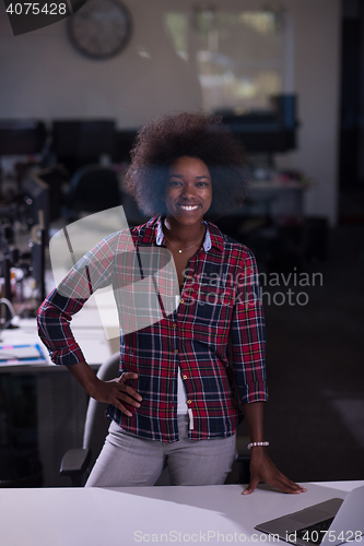 Image of portrait of a young successful African-American woman in modern 