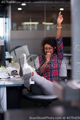 Image of portrait of a young successful African-American woman in modern 