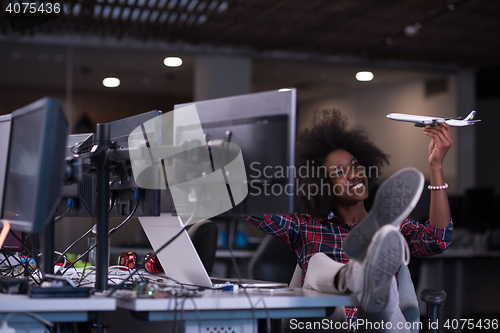 Image of portrait of a young successful African-American woman in modern 