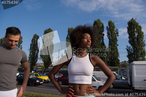 Image of Portrait of romantic pretty couple on fitness session, outside t