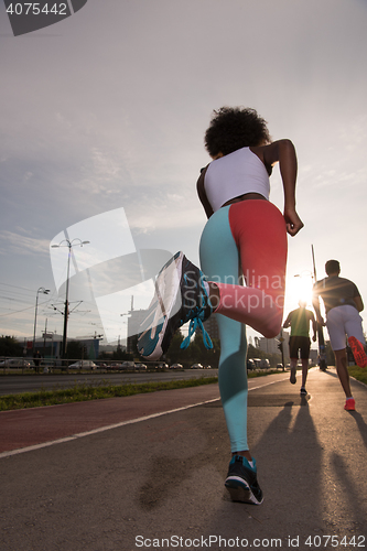 Image of multiethnic group of people on the jogging