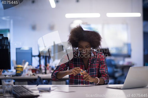 Image of portrait of a young successful African-American woman in modern 