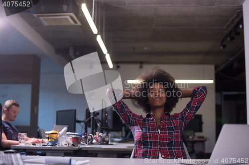 Image of portrait of a young successful African-American woman in modern 