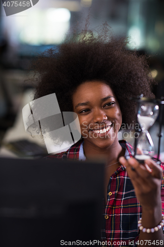 Image of portrait of a young successful African-American woman in modern 