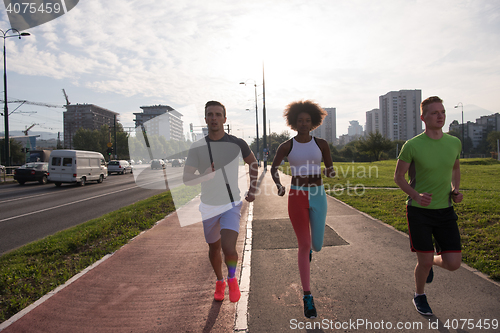 Image of multiethnic group of people on the jogging