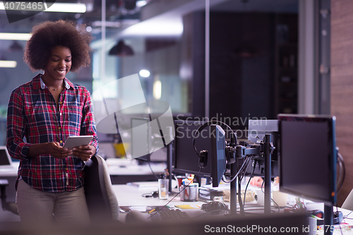 Image of portrait of a young successful African-American woman in modern 