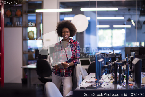 Image of portrait of a young successful African-American woman in modern 