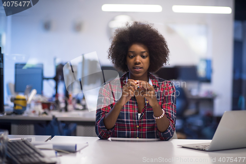 Image of portrait of a young successful African-American woman in modern 