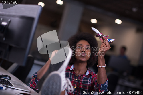 Image of portrait of a young successful African-American woman in modern 