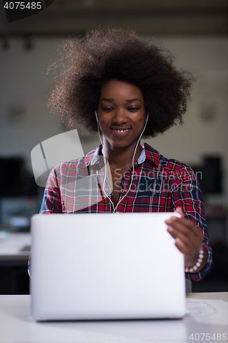 Image of portrait of a young successful African-American woman in modern 