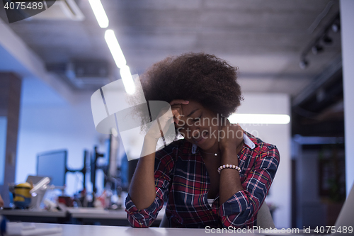 Image of portrait of a young successful African-American woman in modern 