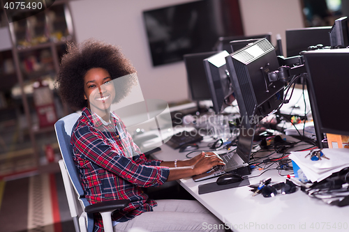 Image of portrait of a young successful African-American woman in modern 