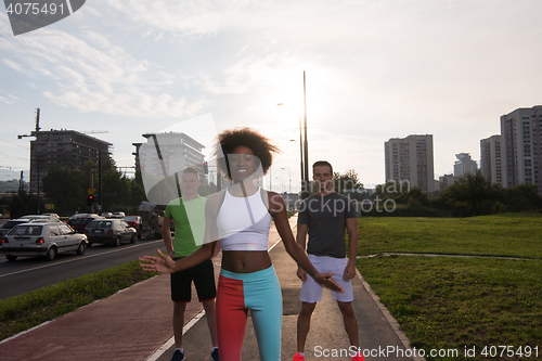 Image of multiethnic group of people on the jogging