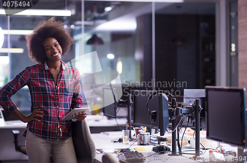 Image of portrait of a young successful African-American woman in modern 