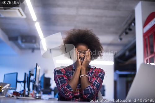 Image of portrait of a young successful African-American woman in modern 