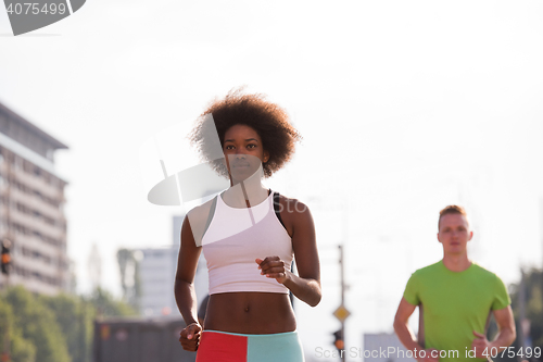 Image of multiethnic group of people on the jogging