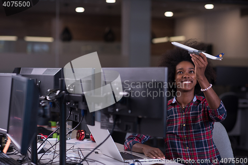 Image of portrait of a young successful African-American woman in modern 