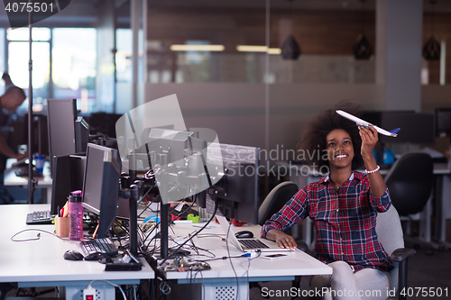 Image of portrait of a young successful African-American woman in modern 