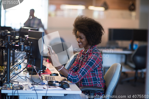 Image of portrait of a young successful African-American woman in modern 